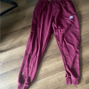 Burgundy Nike sweat pants